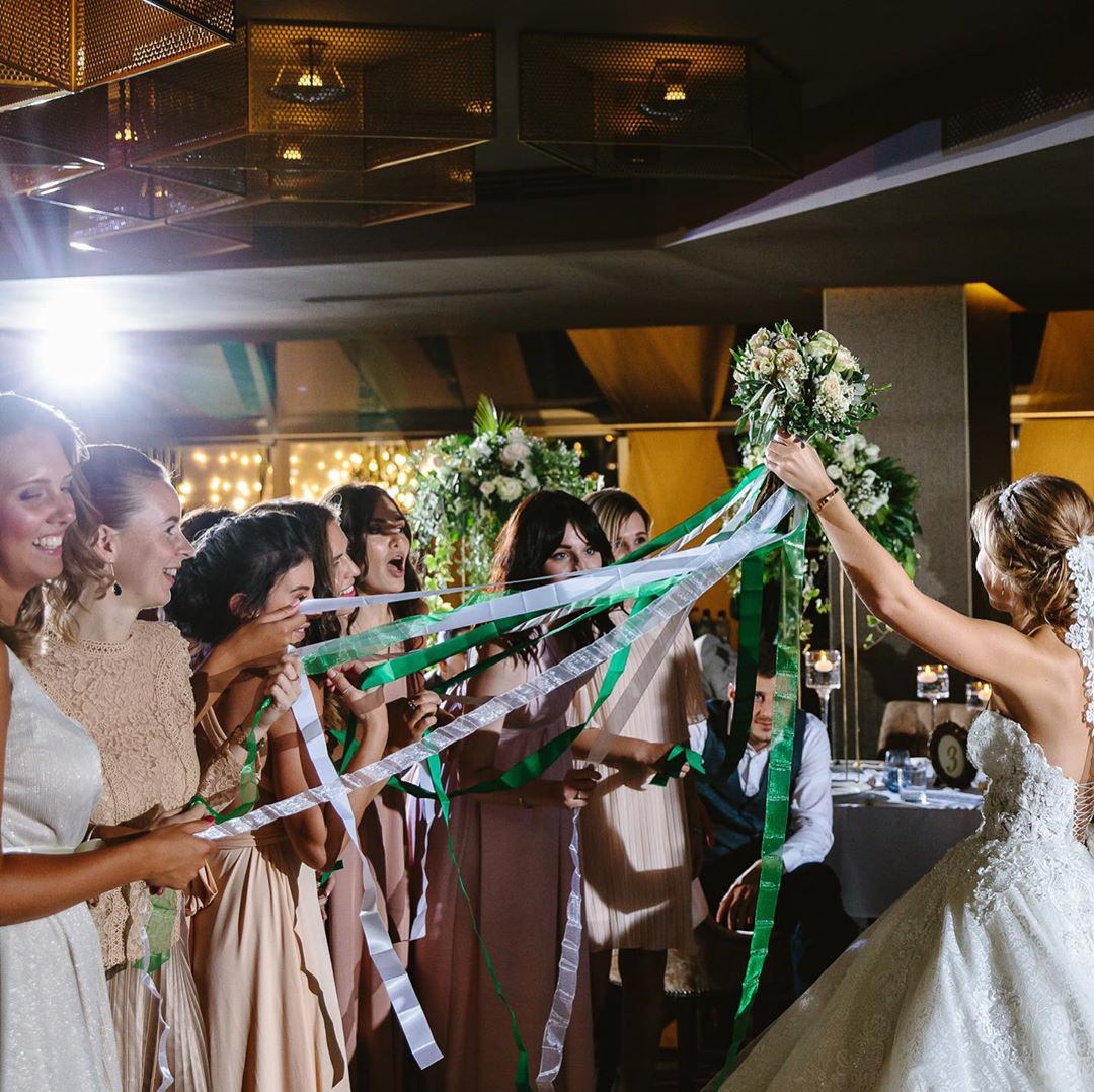 throwing wedding bouquet