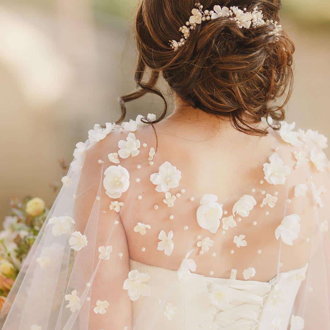 Wedding capes is a new 2020 bridal trend